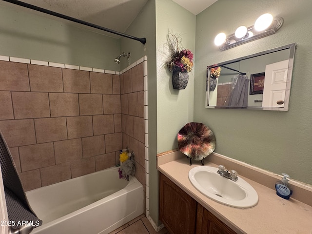 bathroom with shower / bath combination with curtain, vanity, and tile patterned floors