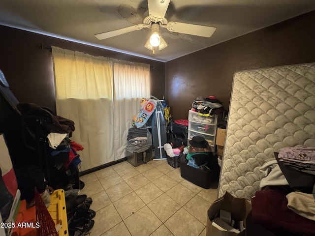 interior space featuring ceiling fan