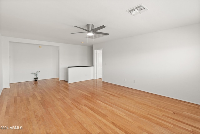 unfurnished room featuring ceiling fan and light hardwood / wood-style floors