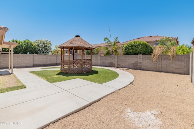 exterior space featuring a gazebo and a patio area