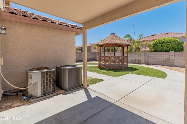 view of patio / terrace featuring a gazebo and central AC unit