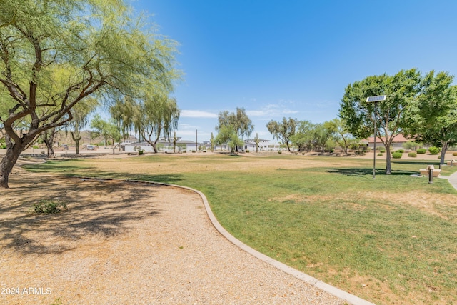 view of home's community featuring a yard