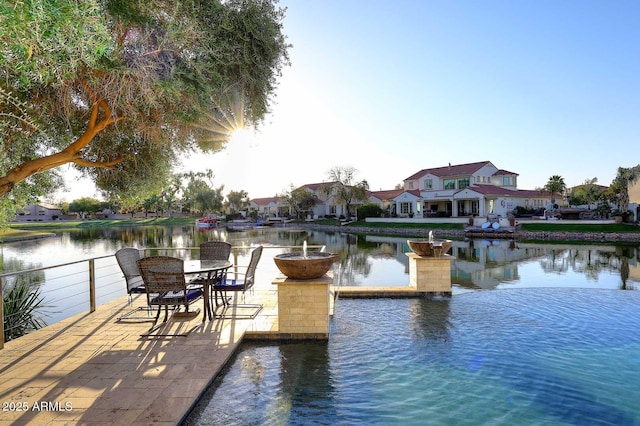 dock area with a water view