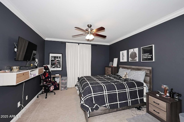 bedroom with ceiling fan, crown molding, and carpet