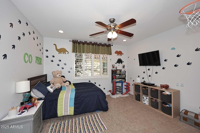 bedroom with recessed lighting, light colored carpet, and a ceiling fan