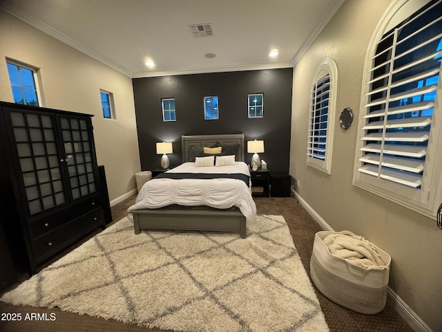 bedroom featuring visible vents, ornamental molding, recessed lighting, carpet floors, and baseboards