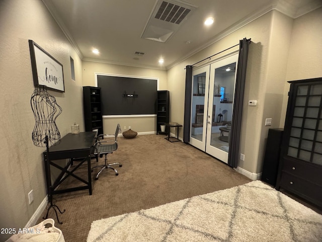 office with visible vents, french doors, crown molding, and carpet