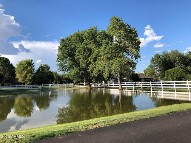 view of water feature with a rural view