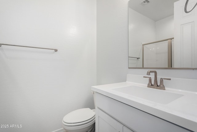 full bathroom with toilet, visible vents, an enclosed shower, and vanity