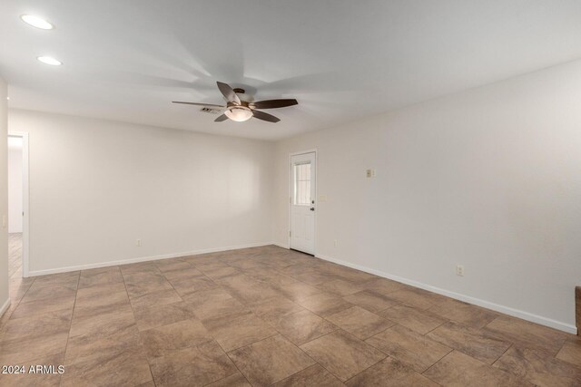 empty room with ceiling fan