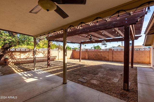 view of patio featuring a pergola and ceiling fan