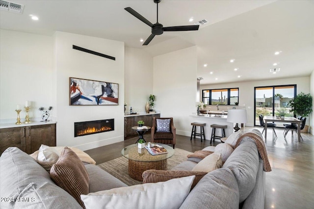 living room with ceiling fan