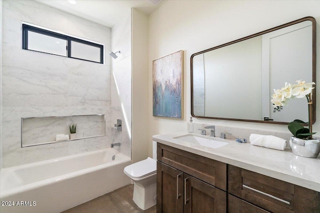 full bathroom with tiled shower / bath, vanity, tile patterned flooring, and toilet