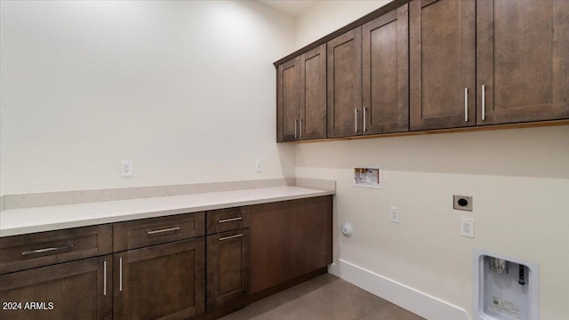 laundry room with washer hookup, gas dryer hookup, cabinets, and electric dryer hookup