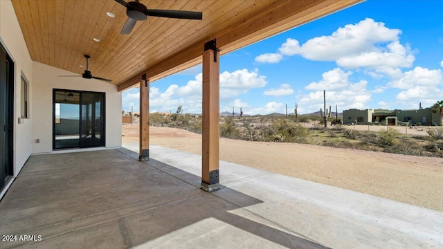 view of patio featuring ceiling fan