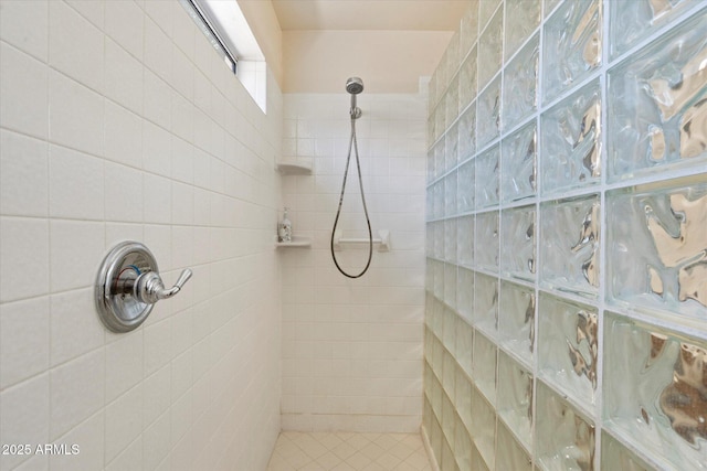 63 W Los Arboles Dr, Tempe, AZ 85284 - full bathroom featuring tile patterned floors, tile walls, and tiled shower