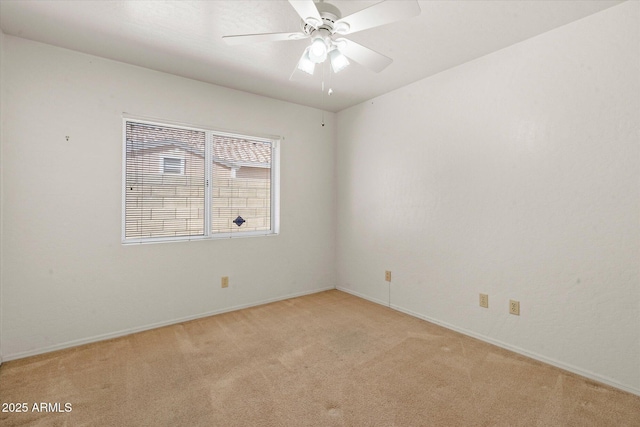 63 W Los Arboles Dr, Tempe, AZ 85284 - empty room with light carpet, baseboards, and ceiling fan