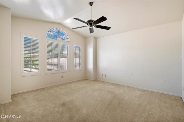 63 W Los Arboles Dr, Tempe, AZ 85284 - spare room with ceiling fan, carpet, baseboards, and lofted ceiling