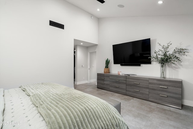 bedroom with a high ceiling