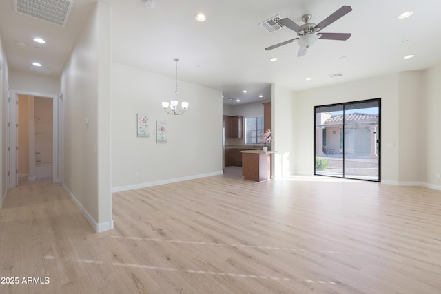 unfurnished living room with recessed lighting, visible vents, and light wood finished floors