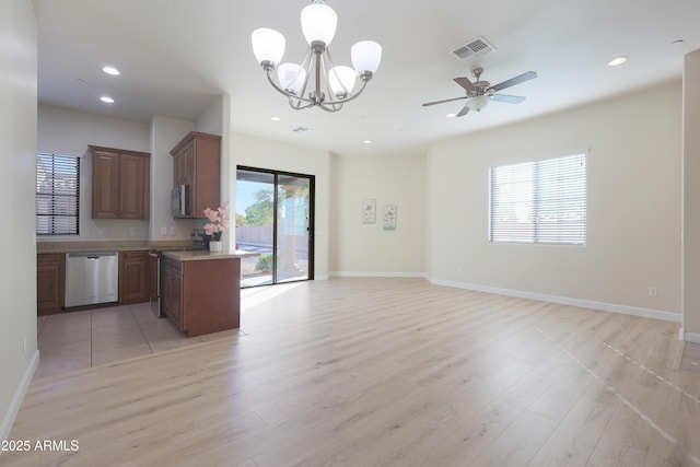 kitchen with visible vents, open floor plan, recessed lighting, light wood-style flooring, and appliances with stainless steel finishes