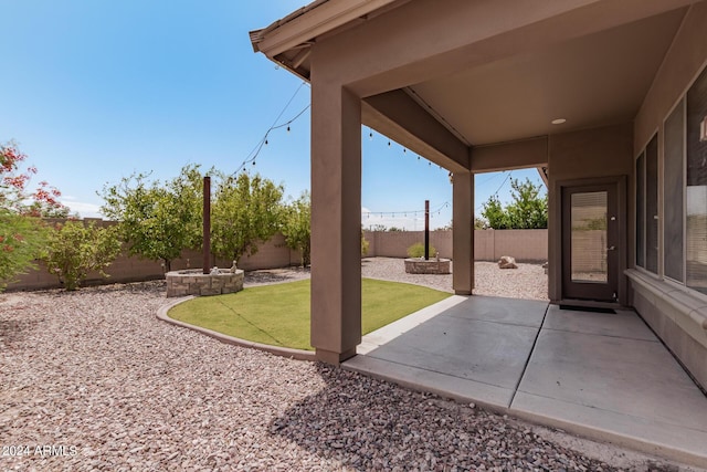 view of yard featuring a patio area and a fenced backyard