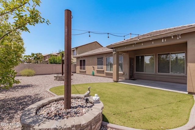 view of yard with a patio area and fence