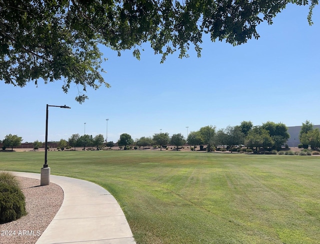 view of home's community featuring a yard