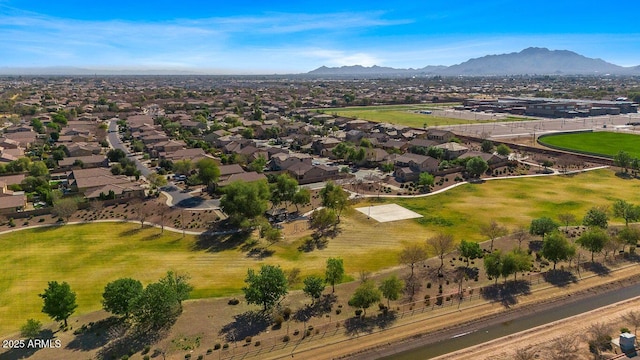 drone / aerial view with a residential view and a mountain view