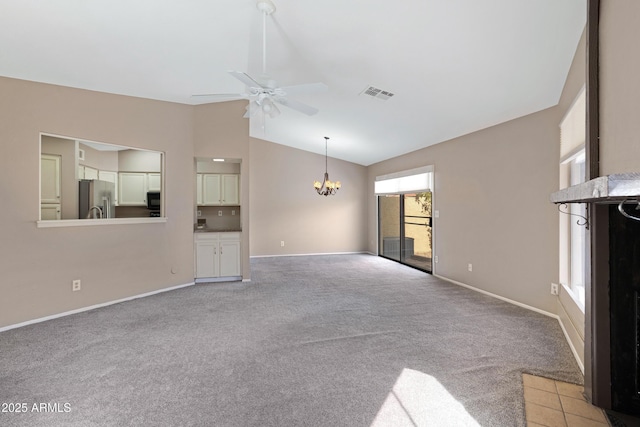 4790 E Navajo St, Phoenix, AZ 85044 - unfurnished living room with vaulted ceiling, light colored carpet, baseboards, a chandelier, and ceiling fan