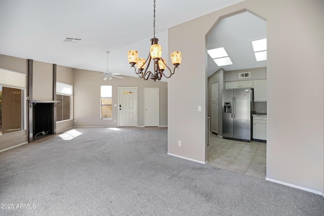 4790 E Navajo St, Phoenix, AZ 85044 - unfurnished living room featuring light carpet, a chandelier, a ceiling fan, arched walkways, and baseboards