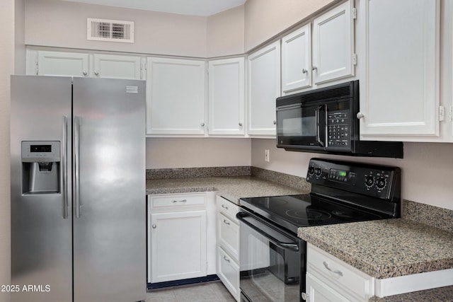 4790 E Navajo St, Phoenix, AZ 85044 - kitchen featuring black appliances, white cabinetry, light tile patterned flooring, and light countertops