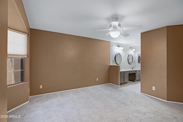 4790 E Navajo St, Phoenix, AZ 85044 - unfurnished bedroom featuring light carpet, ensuite bath, a sink, and ceiling fan