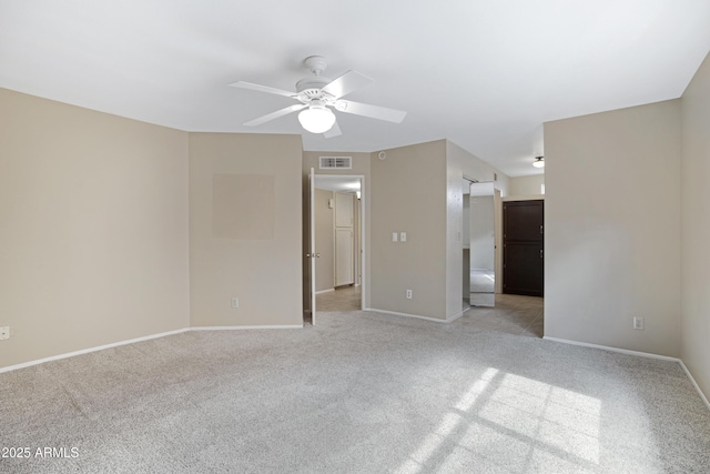 4790 E Navajo St, Phoenix, AZ 85044 - empty room featuring light colored carpet, a ceiling fan, and baseboards