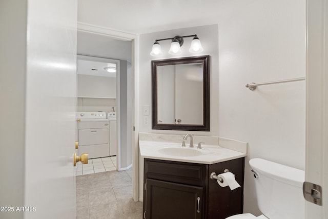 4790 E Navajo St, Phoenix, AZ 85044 - half bath featuring washer and dryer, vanity, toilet, and tile patterned flooring