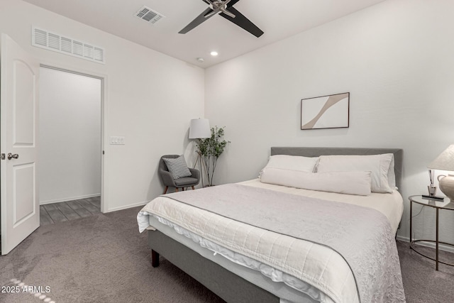 carpeted bedroom with ceiling fan, baseboards, visible vents, and recessed lighting