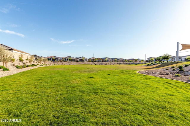 view of yard featuring a residential view
