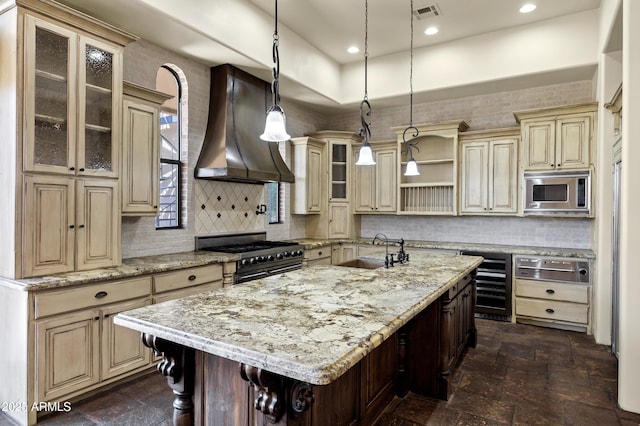 2300 E Sanoque Ct, Gilbert, AZ 85298 - kitchen featuring cream cabinets, custom exhaust hood, wine cooler, appliances with stainless steel finishes, and a sink