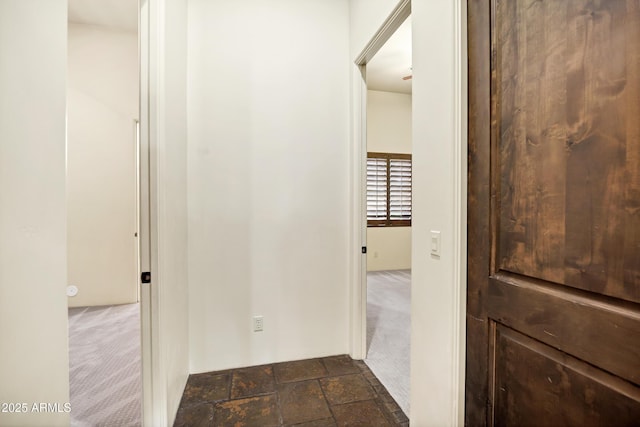 2300 E Sanoque Ct, Gilbert, AZ 85298 - corridor featuring dark carpet and dark stone finish flooring