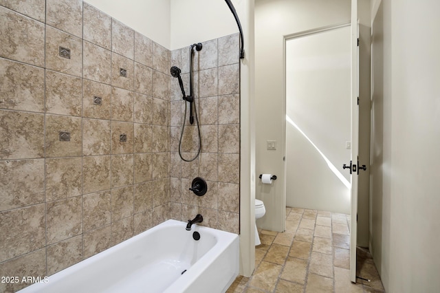 2300 E Sanoque Ct, Gilbert, AZ 85298 - bathroom featuring stone tile flooring, toilet, and shower / bathtub combination