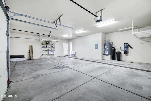 2300 E Sanoque Ct, Gilbert, AZ 85298 - garage with a garage door opener, electric water heater, and electric panel