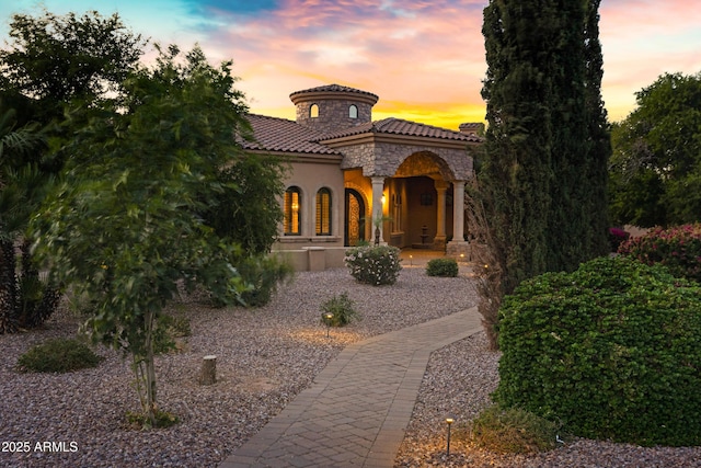 2300 E Sanoque Ct, Gilbert, AZ 85298 - mediterranean / spanish home featuring a tile roof, stucco siding, and stone siding