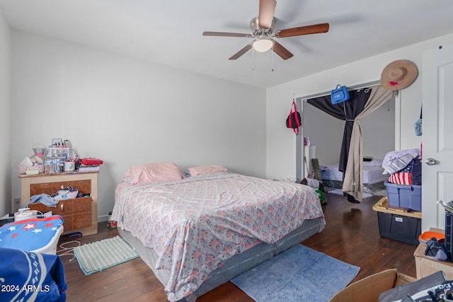 bedroom featuring a ceiling fan and wood finished floors