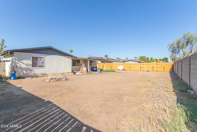 view of yard featuring a fenced backyard