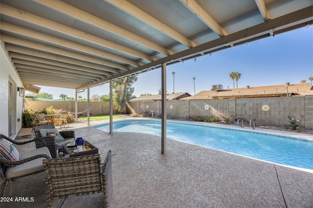 view of pool with a patio