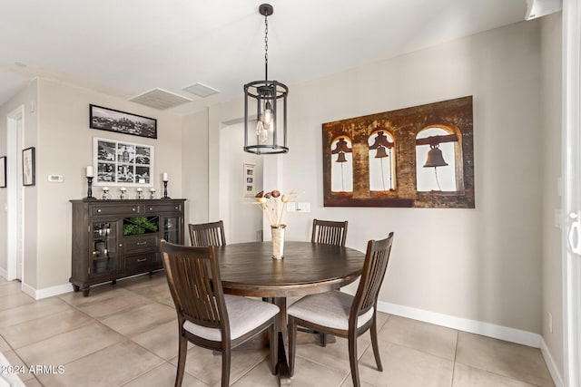 dining room with light tile patterned flooring