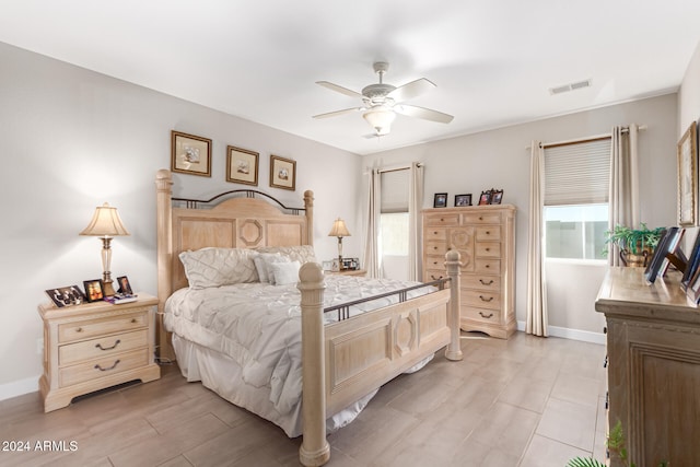 bedroom featuring light wood-type flooring and ceiling fan