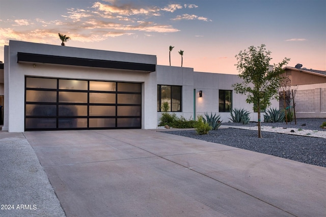 modern home featuring a garage