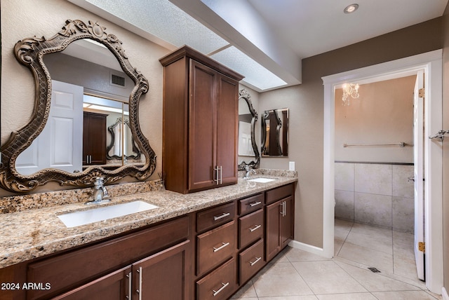 bathroom featuring tile patterned floors and vanity