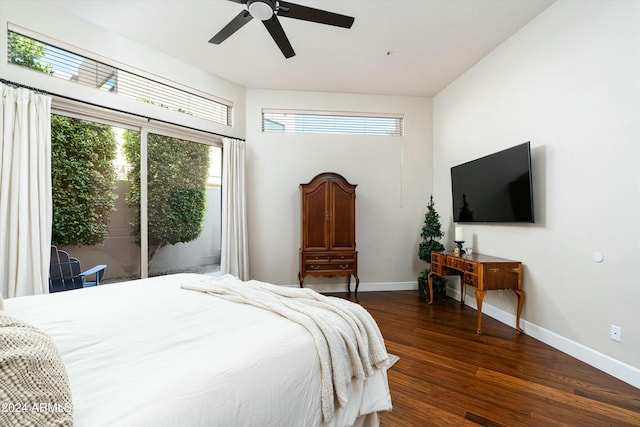 bedroom featuring a ceiling fan, baseboards, and wood finished floors